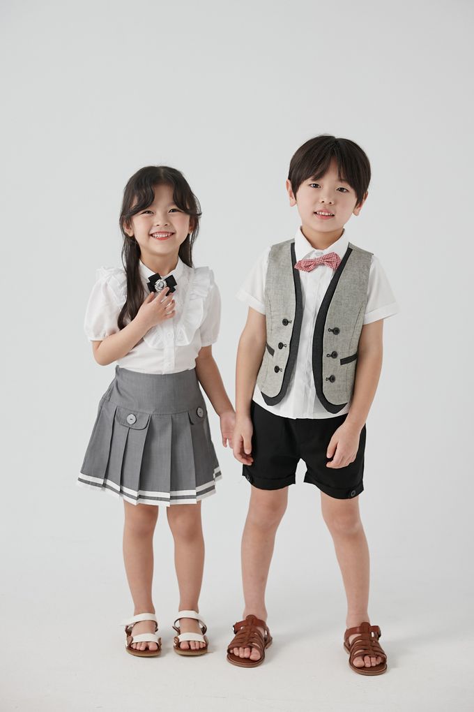 韓國 Coco Bang - (含蝶結)小花鈕扣荷葉領短袖襯衫-藍