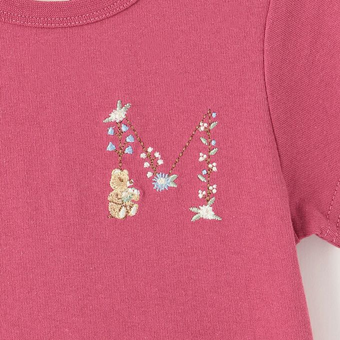 日本 petit main - 荷葉邊英文刺繡短袖上衣-M-桃粉