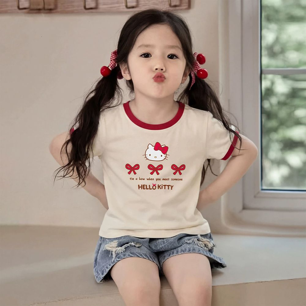 活潑撞色蝴蝶結短袖上衣-卡通人物Hello Kitty-米杏