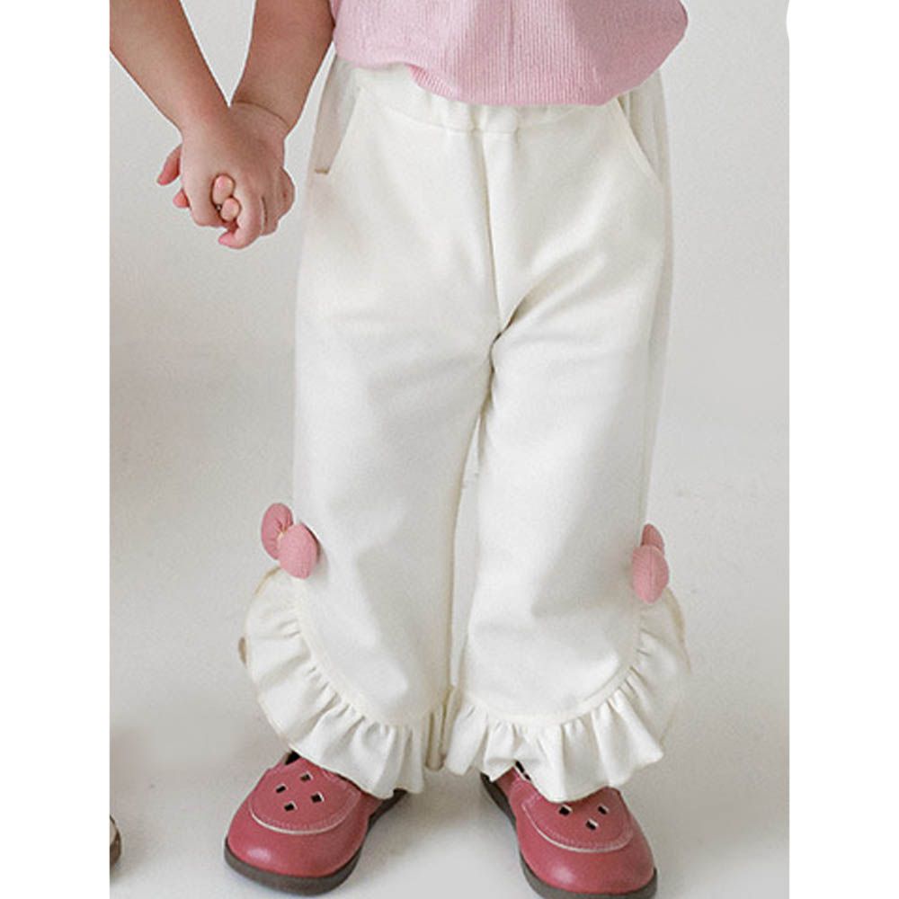 甜心女孩荷葉邊九分褲-蝴蝶結-米白