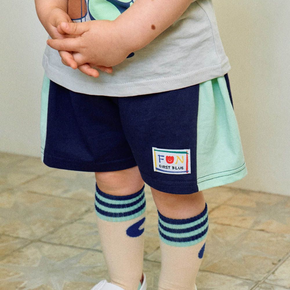 鬆緊腰撞色短褲-黑X淺綠