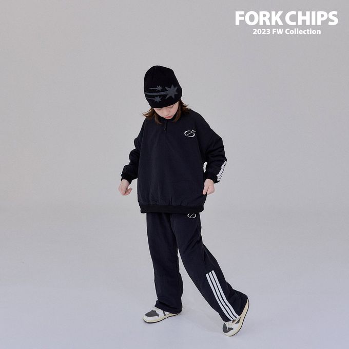 韓國 FORK CHIPS - 鬆緊腰穿越星星防風休閒長褲-黑
