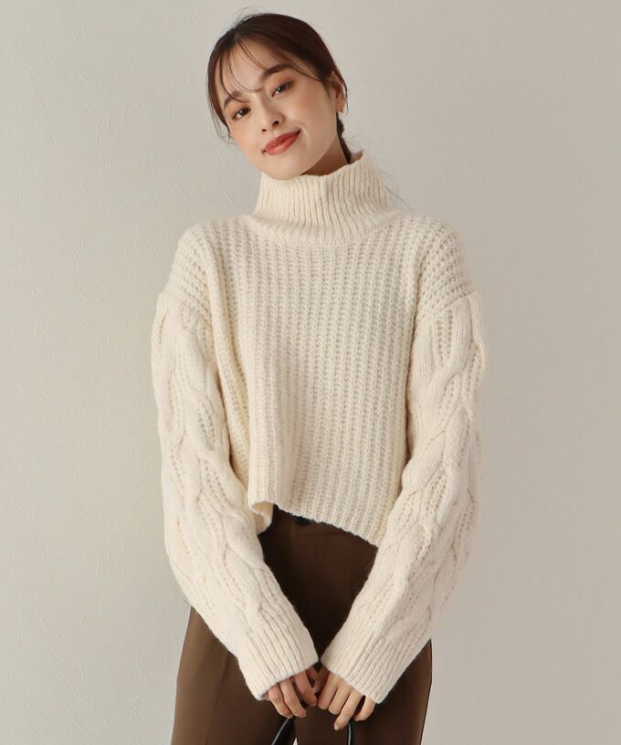 日本 BLUE EAST - 高領麻花編泡泡袖短版毛衣-象牙杏