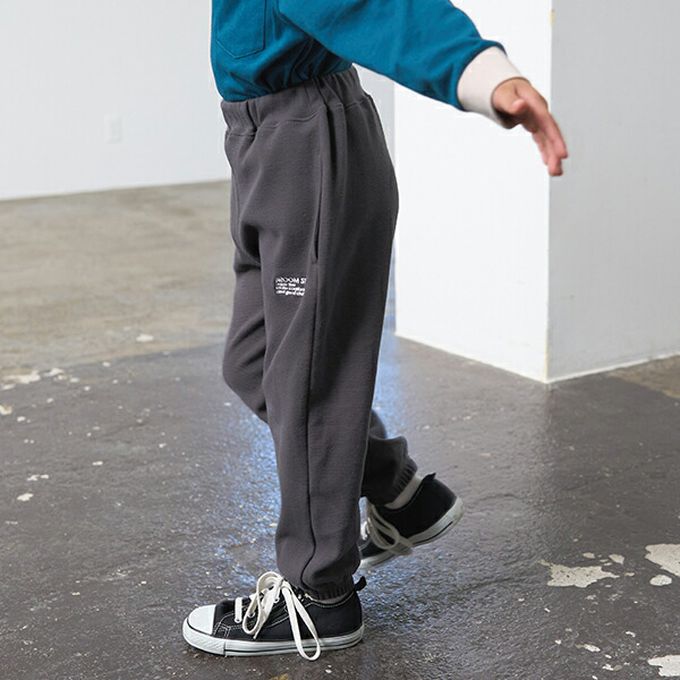 日本 b-ROOM - 彈性休閒素色運動風長褲-海軍藍