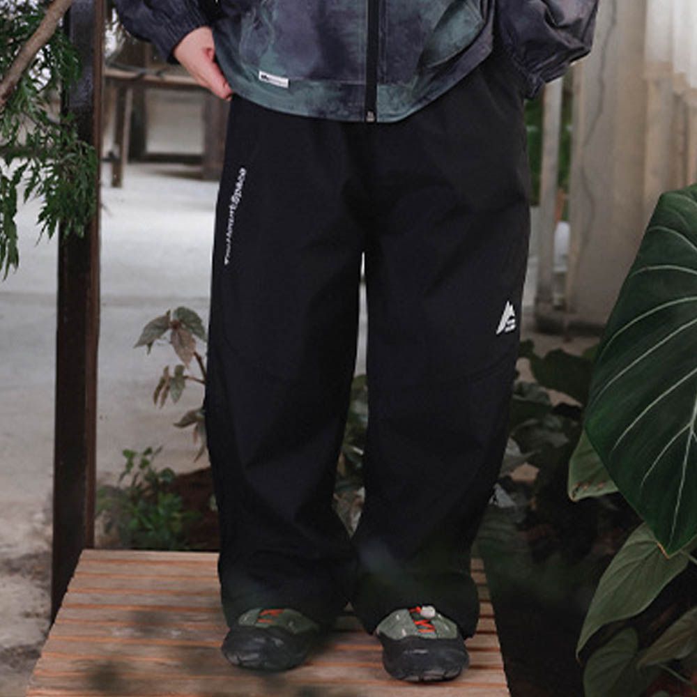 防潑水薄刷絨側開拉鍊長褲-黑色