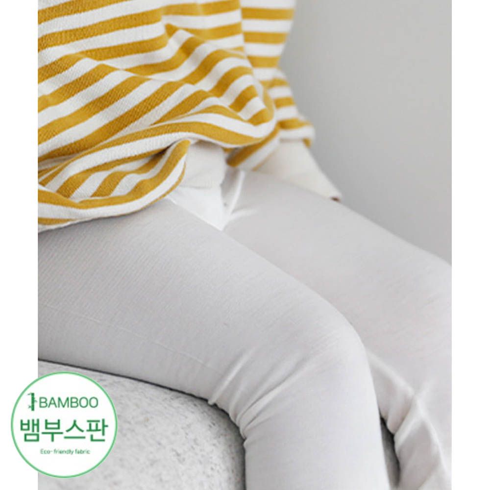 柔膚透氣竹纖維彈力七分褲-米白