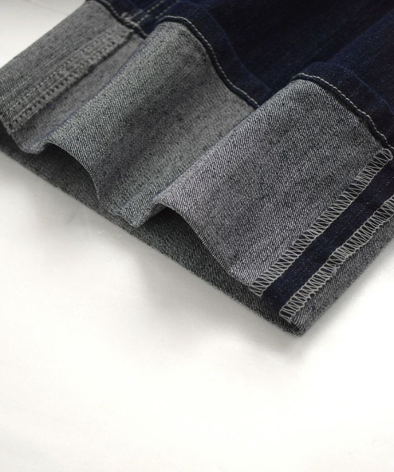 日本 zootie - 修身打褶反折單寧牛仔褲-靛藍