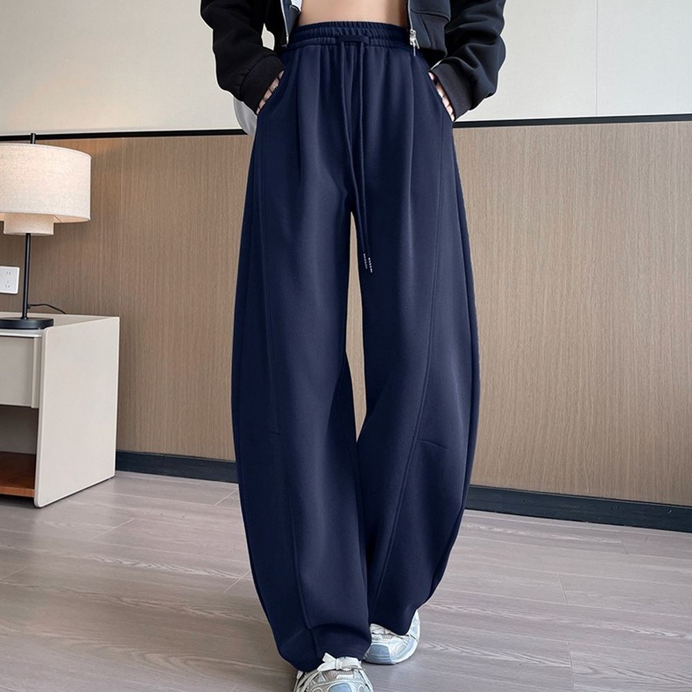 顯瘦修飾胯寬運動休閒彎刀褲-藏青