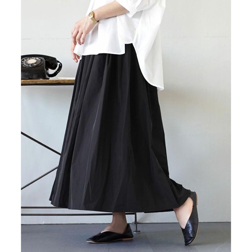 日本 zootie - 低調光澤修身顯瘦長裙-黑