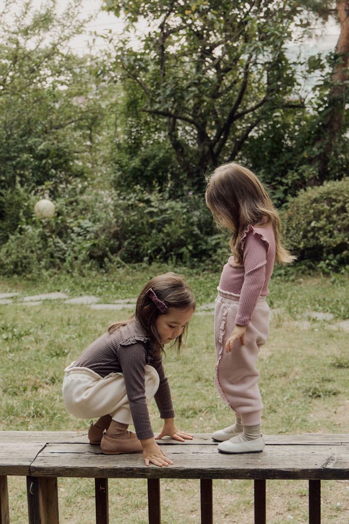 韓國 Puellaflo - 蕾絲布翅膀點綴彈性上衣-粉紫