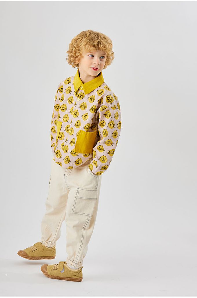 韓國 OZKIZ - 鬆緊腰縫線點綴縮口長褲-象牙白