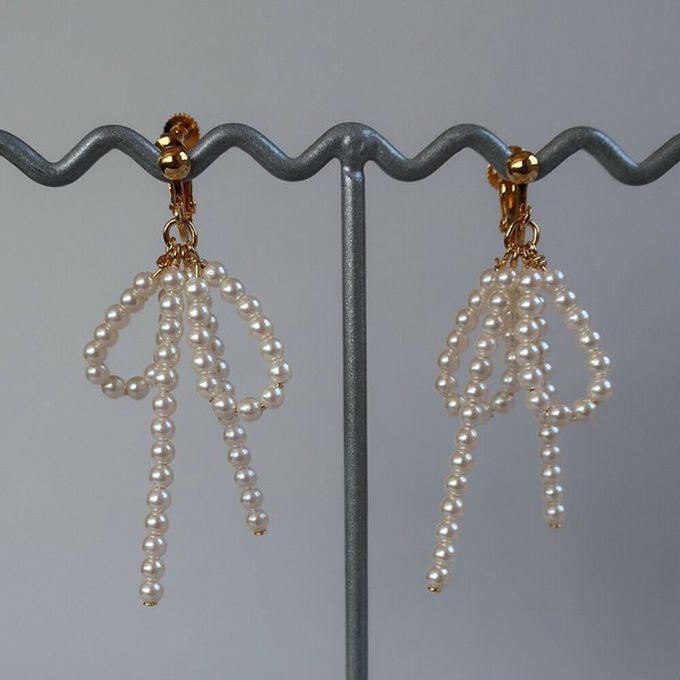 日本 Melody Accessory - 可愛感珍珠蝴蝶結耳環-金