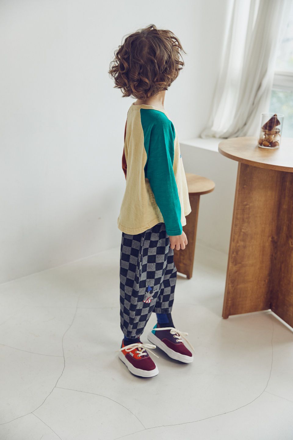 韓國 Mimico - 方塊格紋鬆緊腰休閒長褲-獅子與浣熊-黑