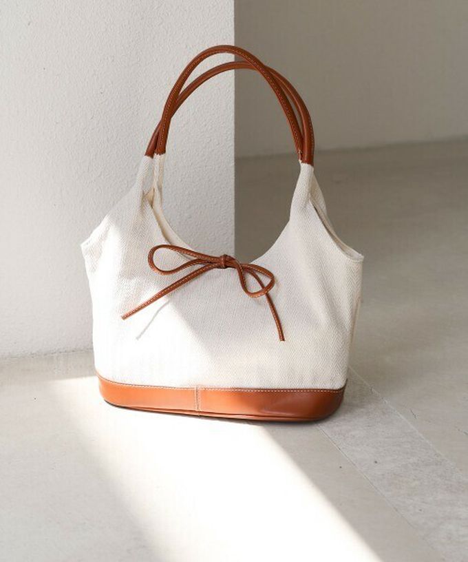 日本 Bab - 異素材成熟感蝴蝶結氣質手提包-藍x黑