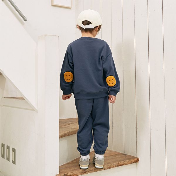 日本 b-ROOM - 療癒笑臉刺繡長袖上衣-深藍