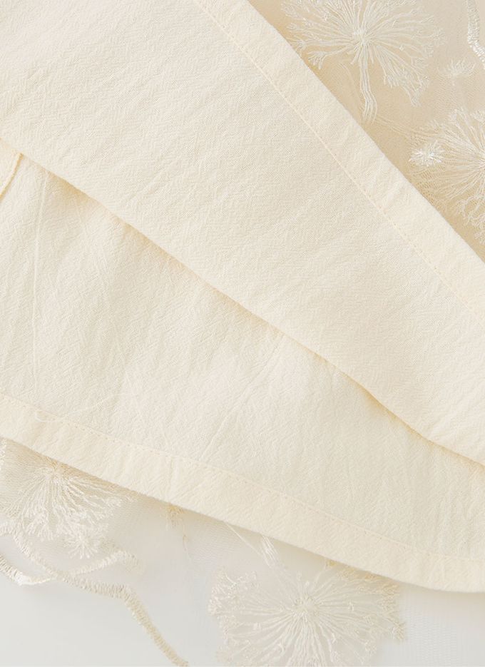 韓國 OZKIZ - 蒲公英繡拼接網紗連身洋裝-米