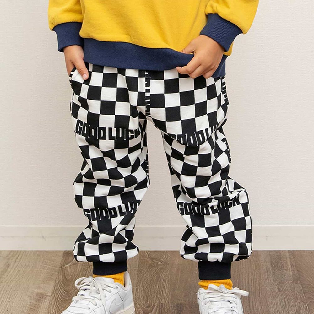 美式滿版印花束口休閒長褲-棋盤格-黑白