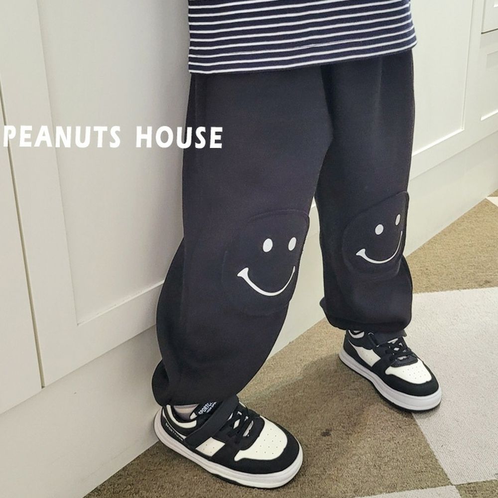 Peanuts House (內磨毛)鬆緊腰笑臉拼貼縮口長褲-黑