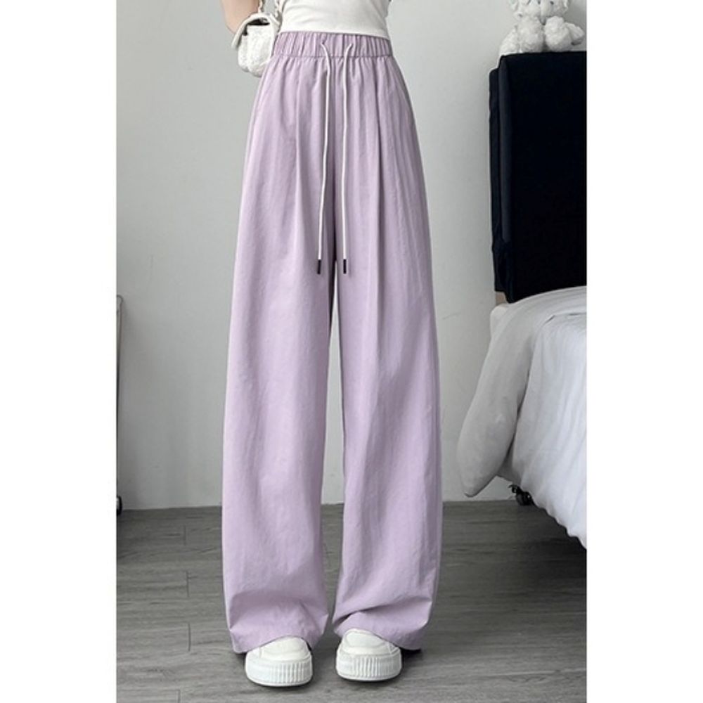 顯瘦修身冰絲休閒彎刀褲-紫