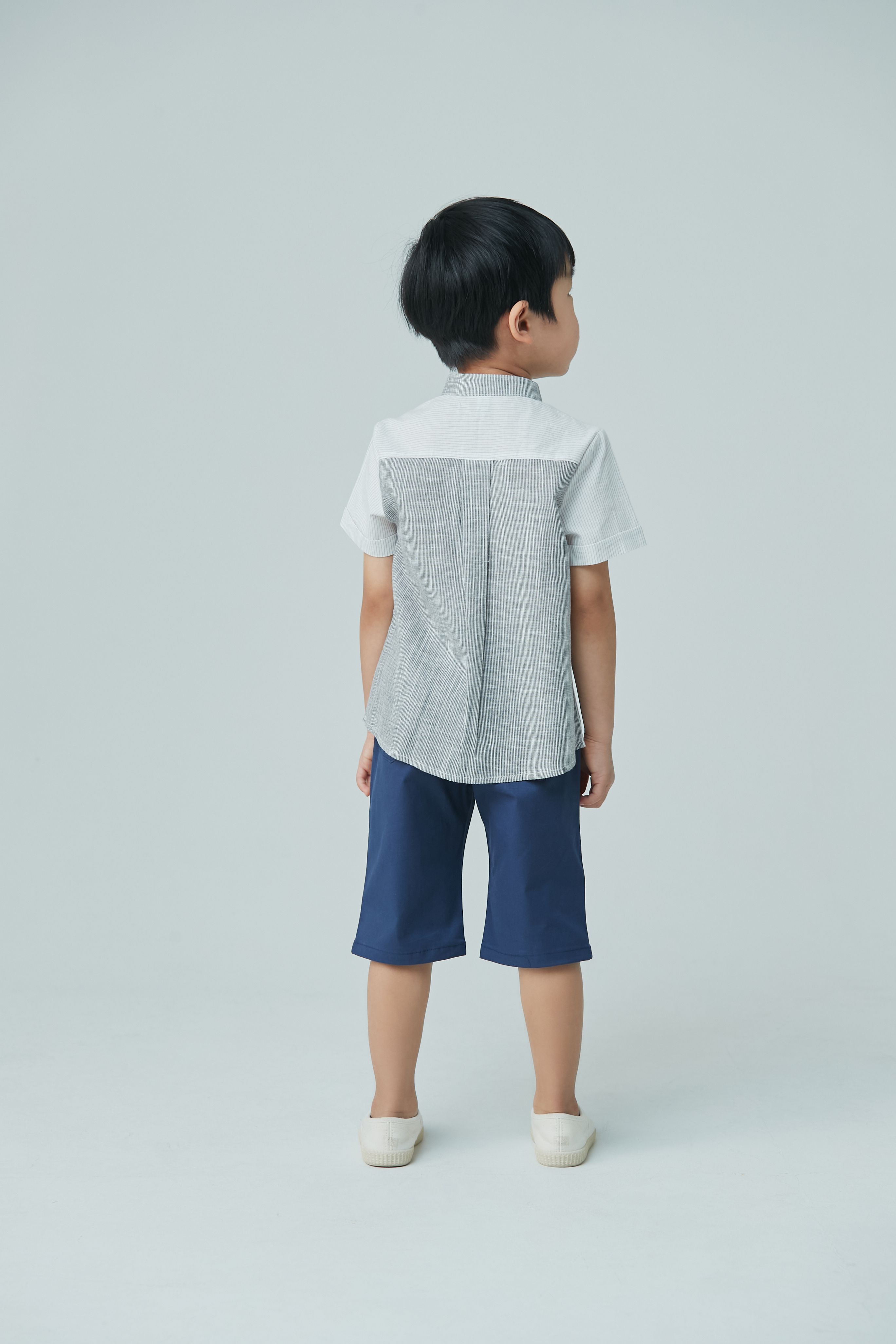 韓國 Coco Bang - 鬆緊腰斜口袋7分褲-藍