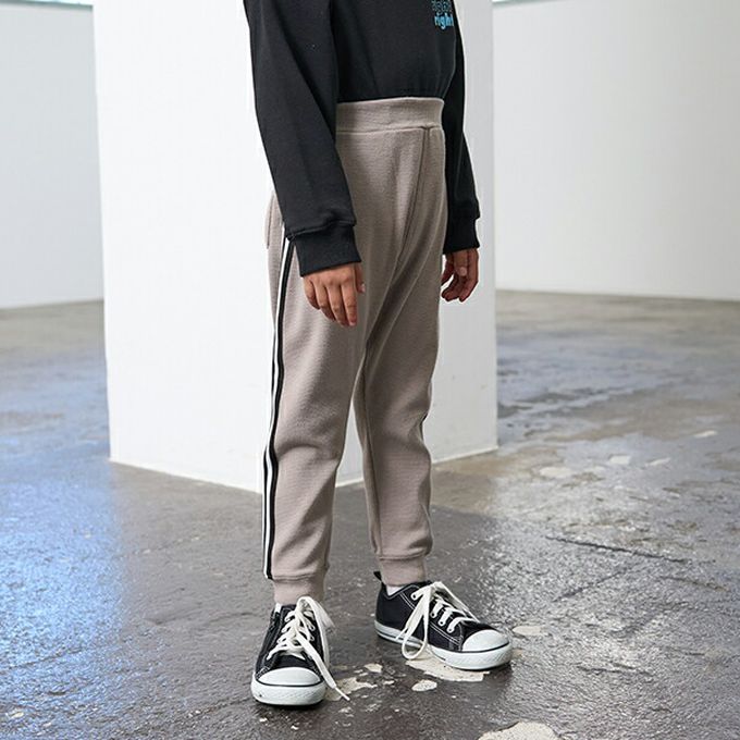 日本 b-ROOM - 側邊線條運動風束口長褲-灰杏