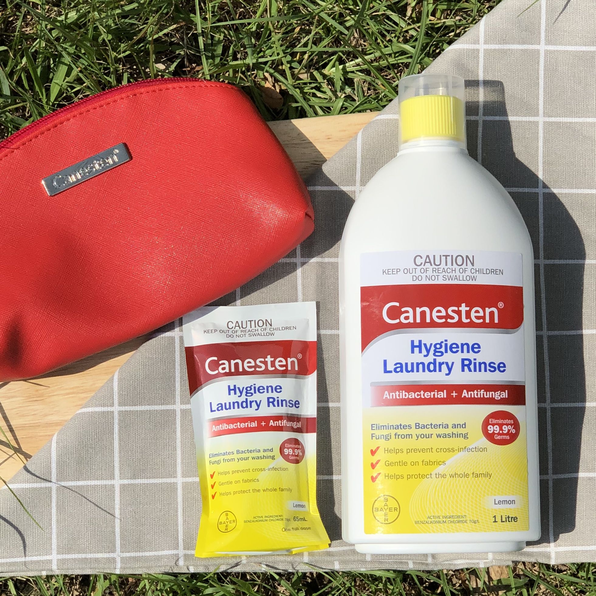 德國 BAYER 拜耳 - Canesten 衣物除菌消毒液-澳洲版-Lemon-1212特談超殺組(買3大送3小再送紅運化妝包)-1000ml*3+65ml*3+紅運化妝包*1
