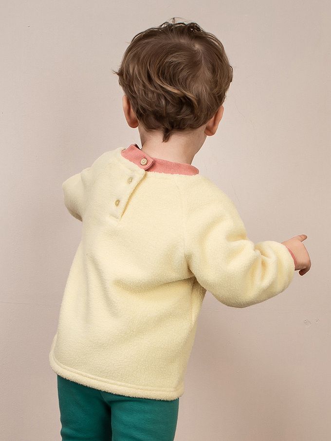 韓國Pimpollo - 圓臉插圖背釦保暖上衣-象牙色