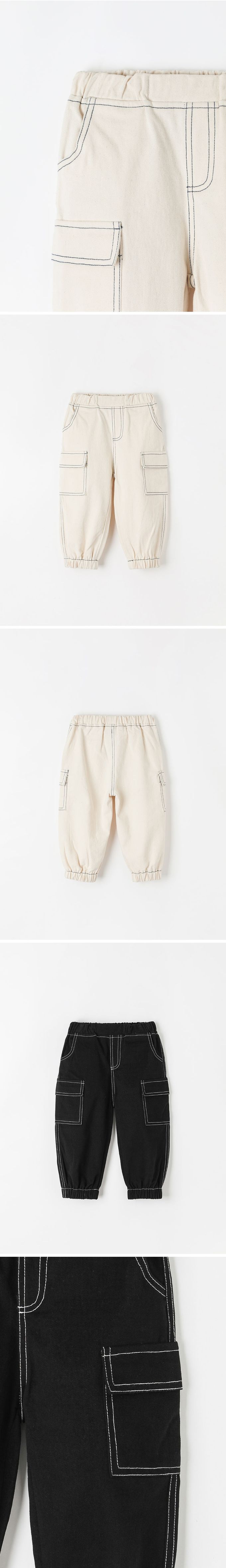 韓國 OZKIZ - 鬆緊腰縫線點綴縮口長褲-象牙白