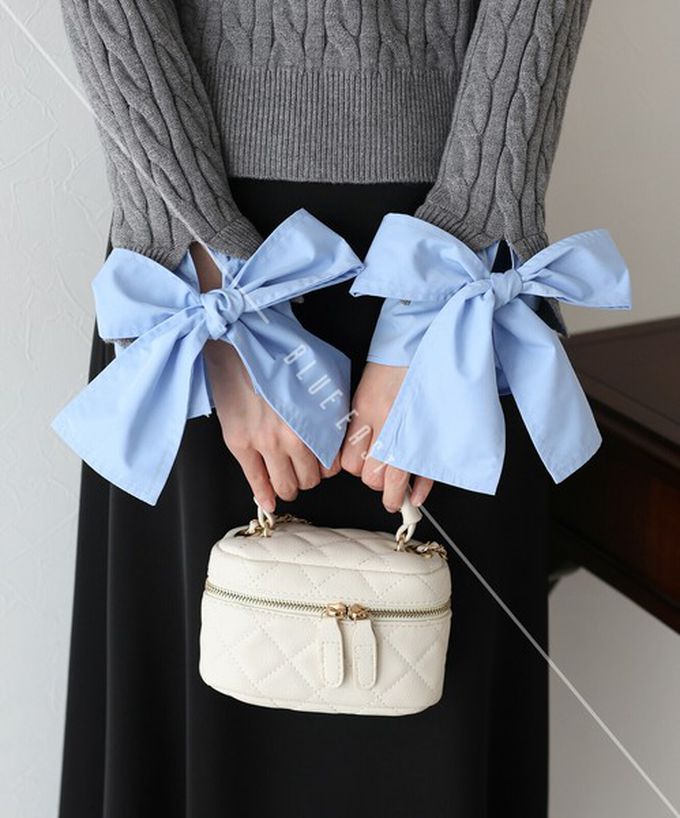 日本 BLUE EAST - 亮麗蝴蝶結緞帶袖麻花針織上衣-海軍藍