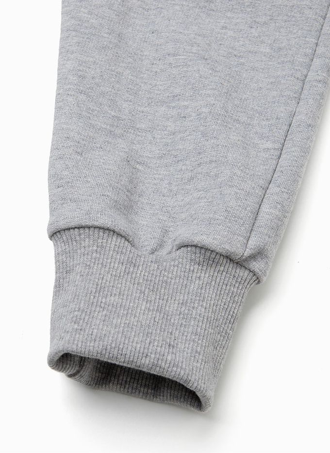 韓國 OZKIZ - 鬆緊腰側邊大口袋縮口長褲-象牙白