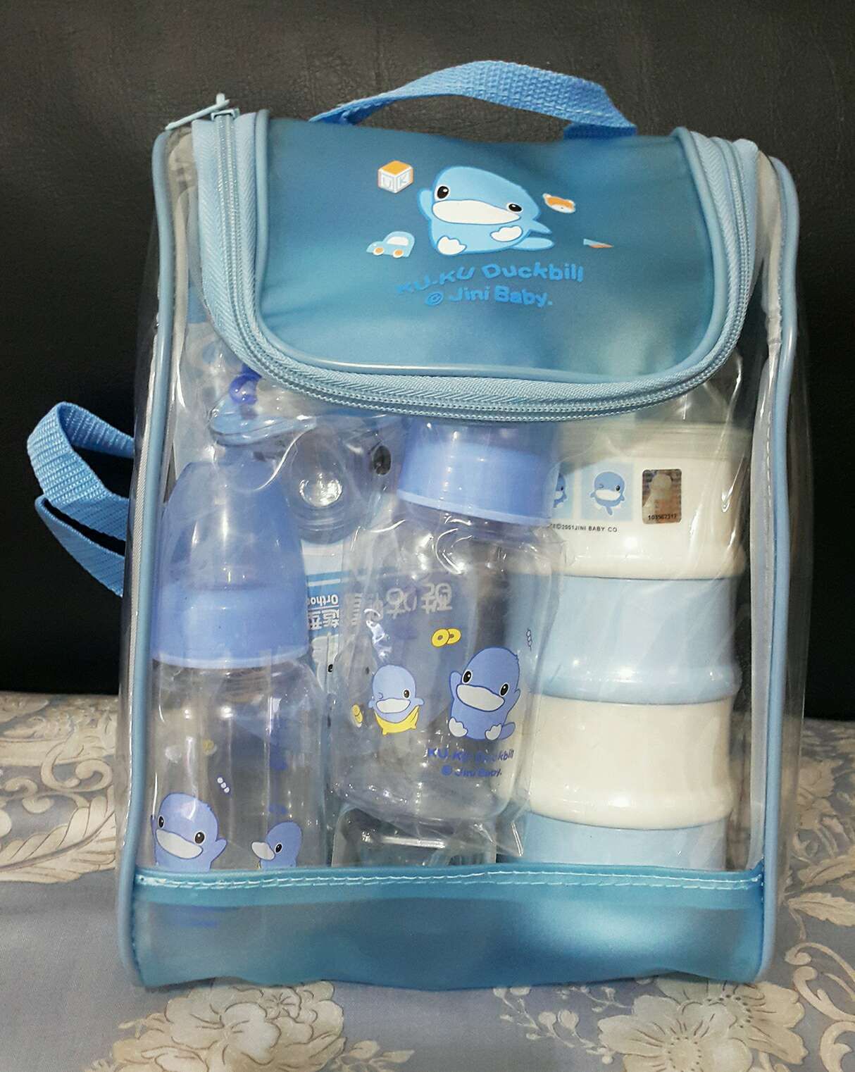 酷酷鴨奶瓶組背包便宜售500元