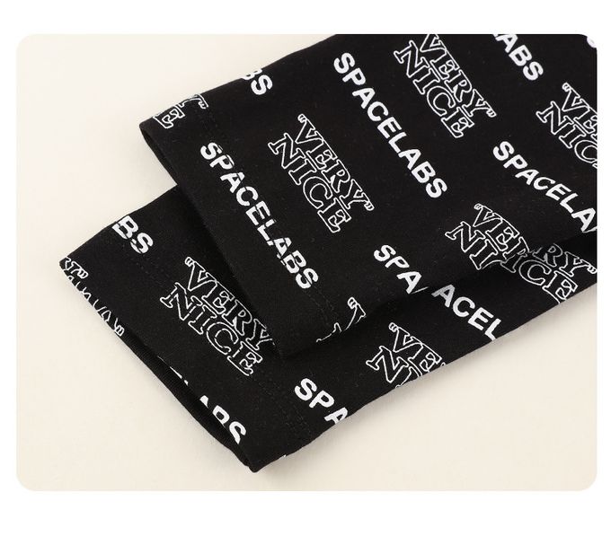 圓領假兩件長袖上衣-漂浮太空人-黑+螢光綠色