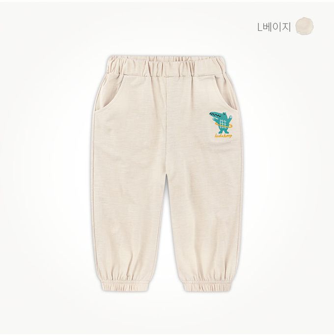 韓國 milk mile - 鬆緊腰鱷魚刺繡縮口長褲-淺杏