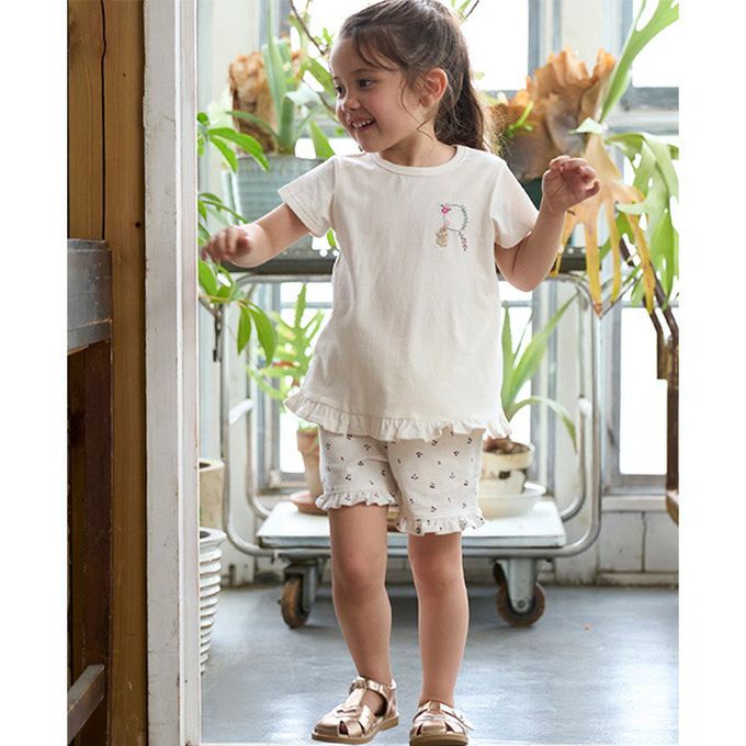 日本 petit main - 荷葉邊英文刺繡短袖上衣-H-淺粉紅