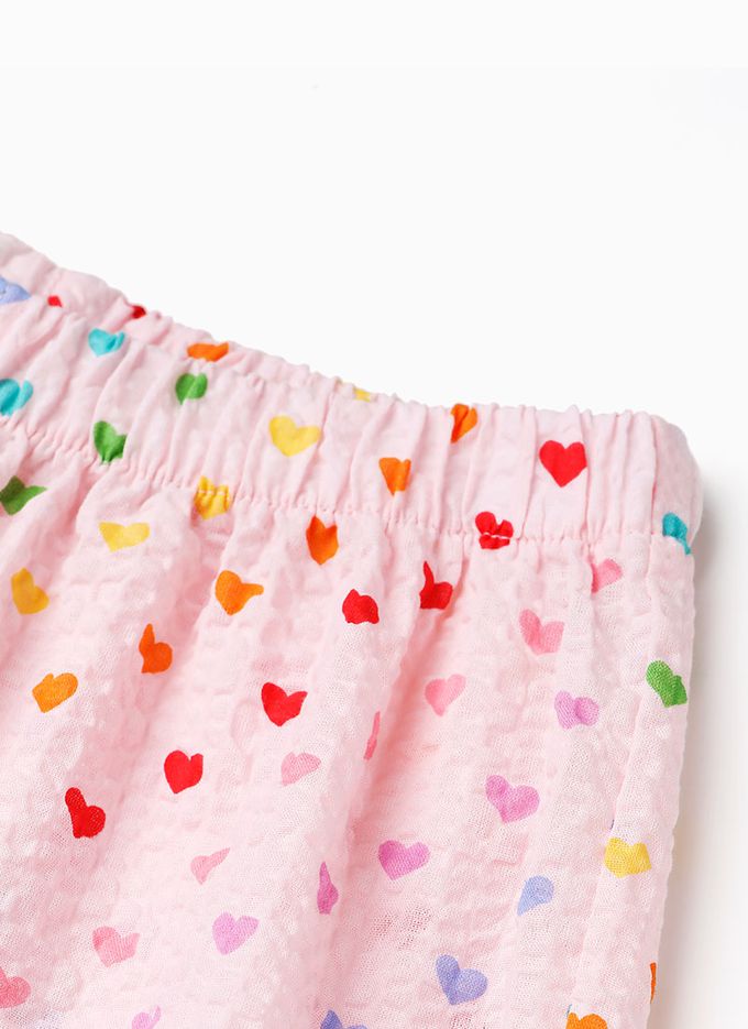 韓國 OZKIZ - 鬆緊腰滿版印花縮口防蚊褲-彩色愛心-淡粉