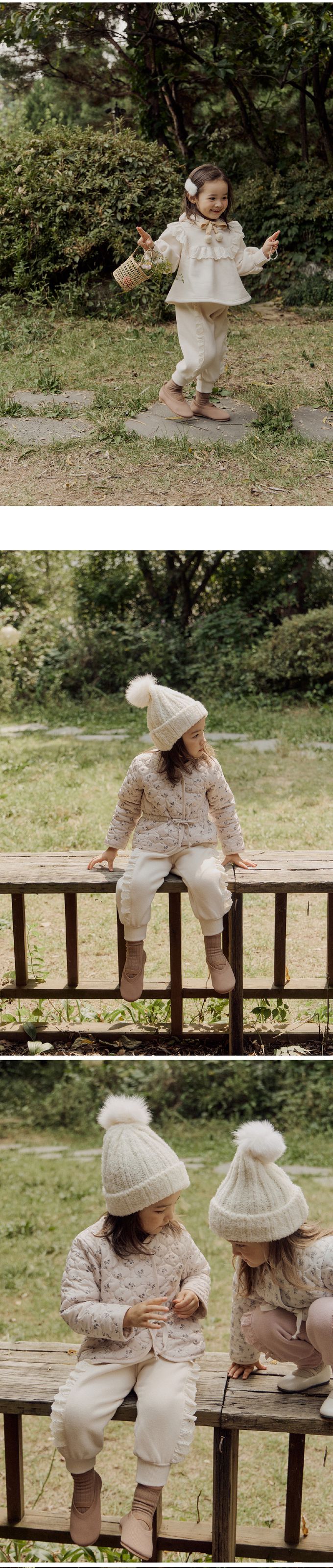 韓國 Puellaflo - 鬆緊腰蕾絲花點綴縮口長褲-米白