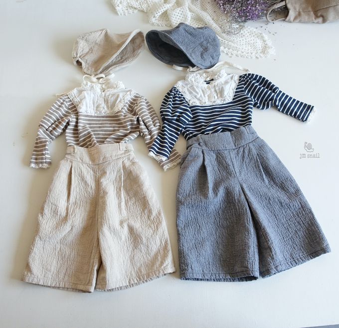 韓國 Jmsnail - 鬆緊腰鈕扣裝飾壓紋長褲-淺卡其