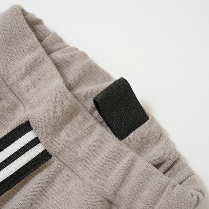 日本 b-ROOM - 側邊線條運動風束口長褲-水藍