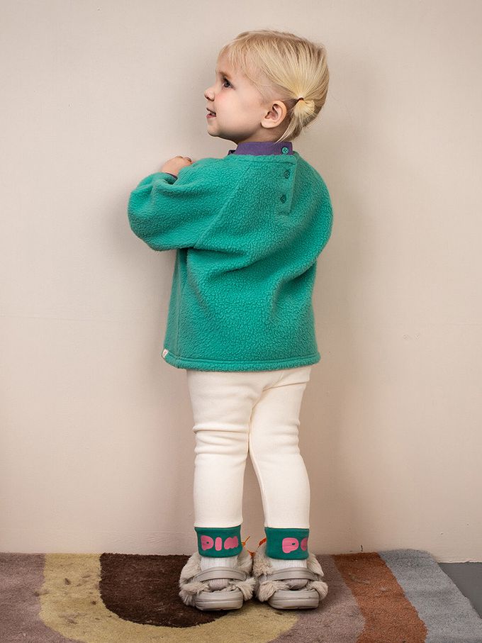 韓國Pimpollo - 圓臉插圖背釦保暖上衣-象牙色