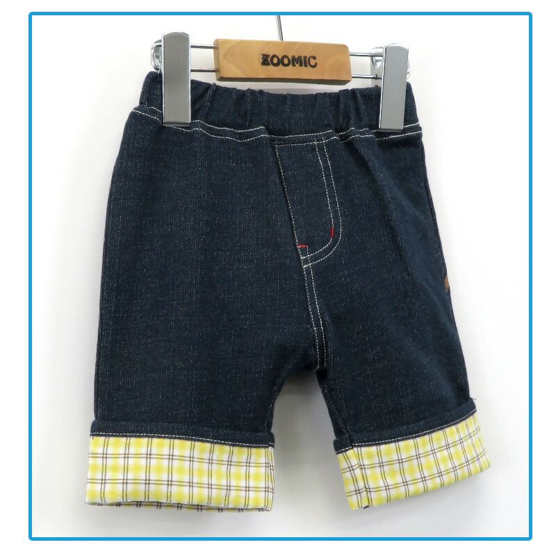 日本 ZOOLAND - 背後童趣印花下擺摺邊短褲-卡其