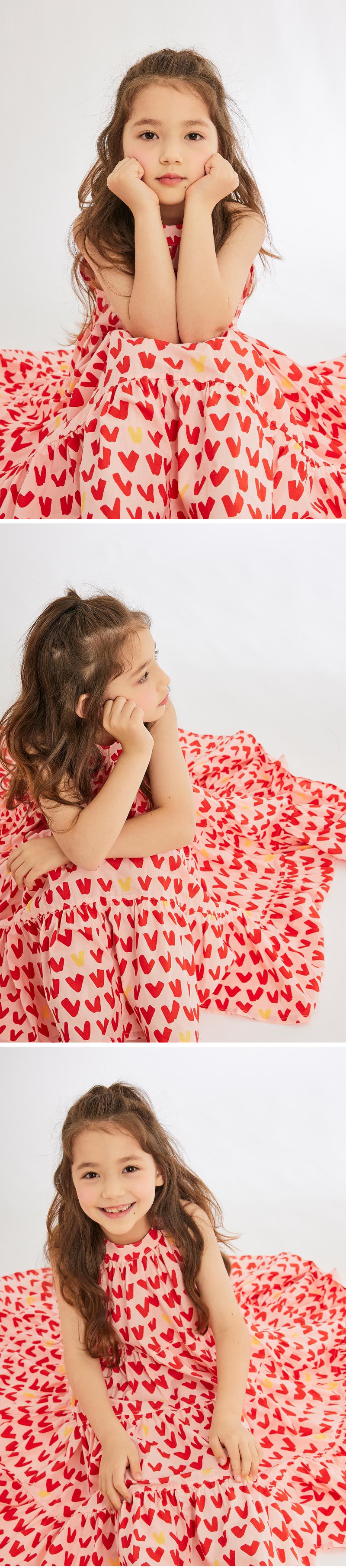 韓國 OZKIZ - 滿版愛心拼接感長版洋裝