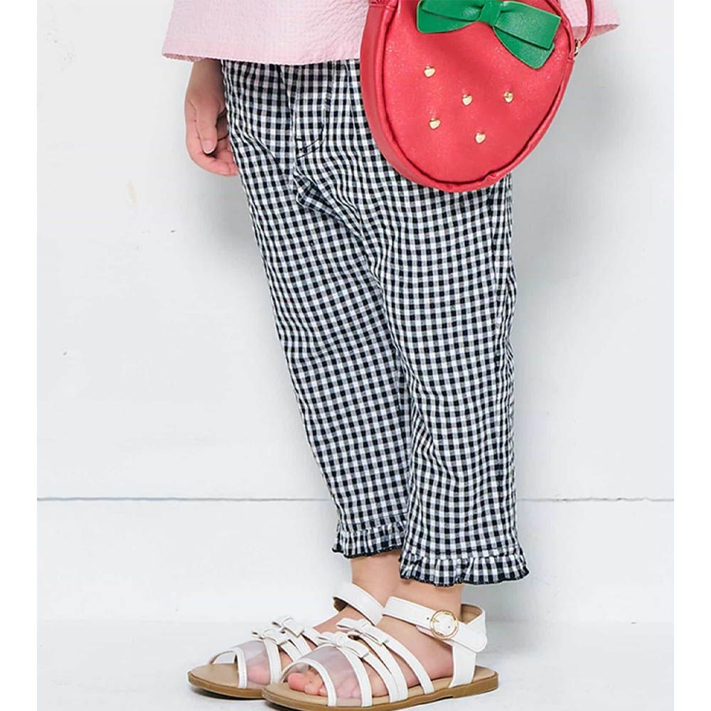 心型口袋小荷葉下襬8分褲-格子-黑x白