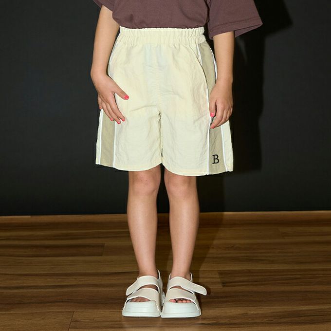 日本 b-ROOM - 輕盈尼龍側邊線條短褲-象牙白