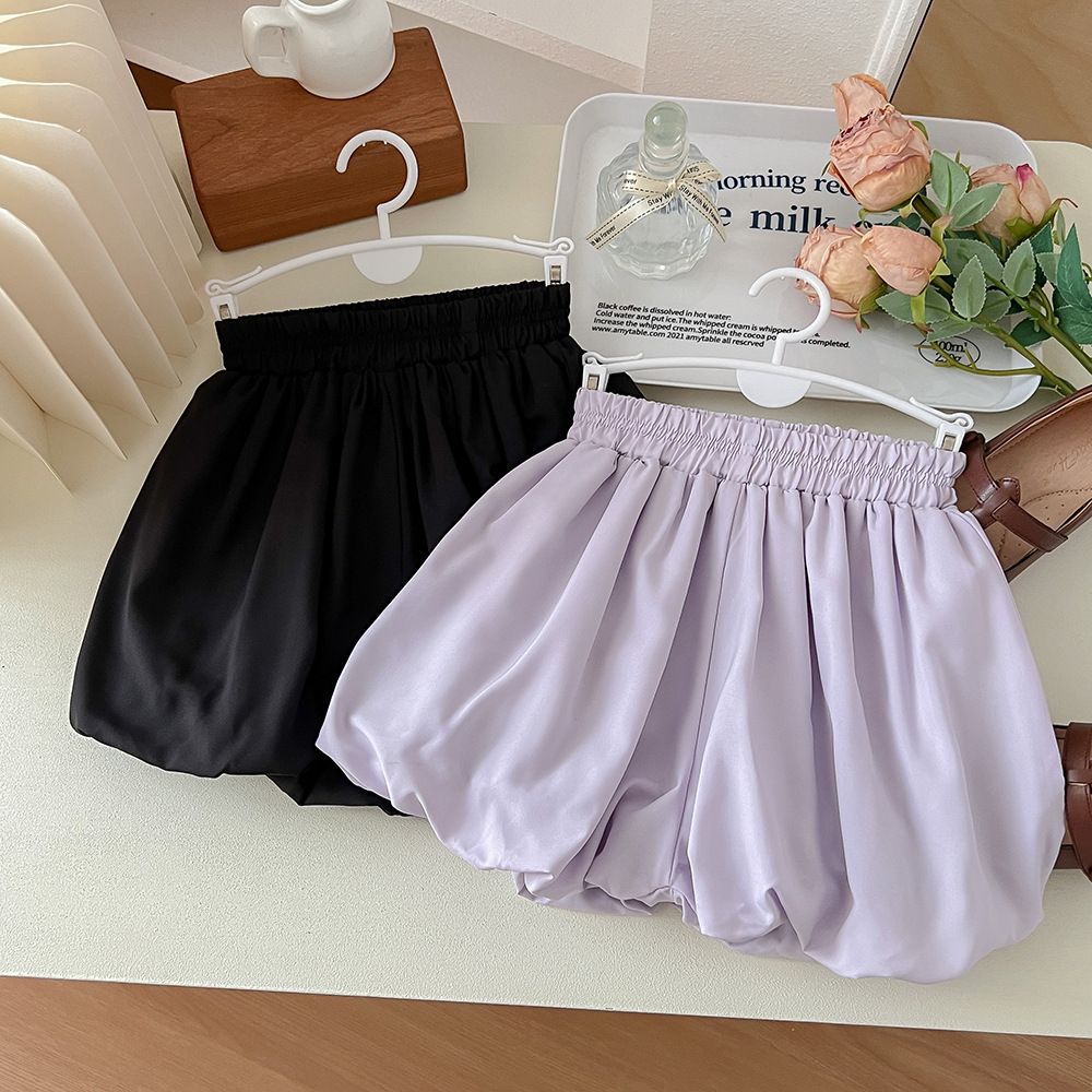 腰鬆緊顯瘦休閒花苞短褲-黑色