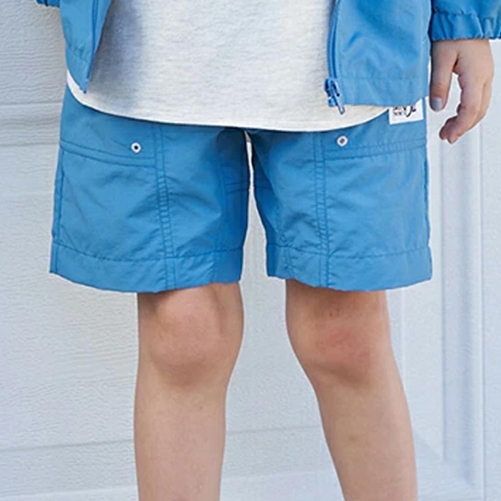 日本 b-ROOM - 潑水加工 休閒口袋4分短褲-寶石藍