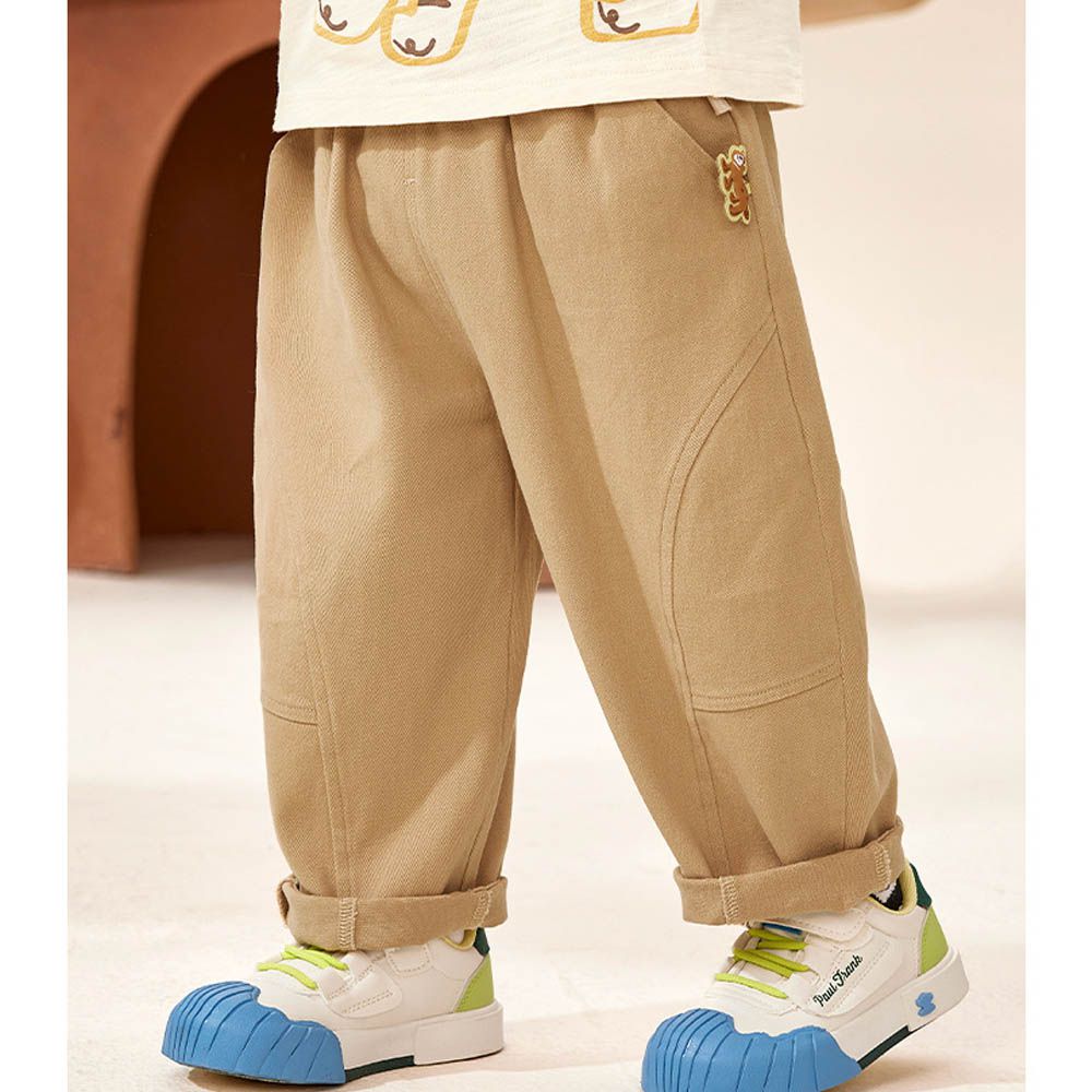 腰鬆緊百搭休閒長褲-澎澎立體裝飾-卡其色