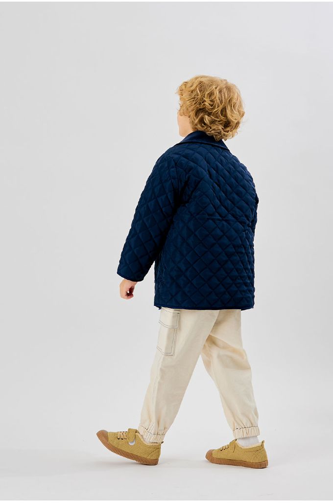 韓國 OZKIZ - 鬆緊腰縫線點綴縮口長褲-象牙白