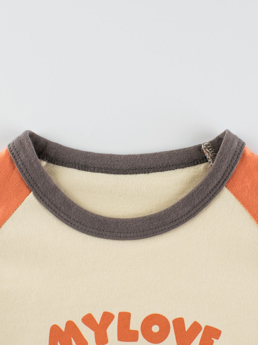 純棉圓領薄長袖上衣-滑板兔兔-杏+深橘