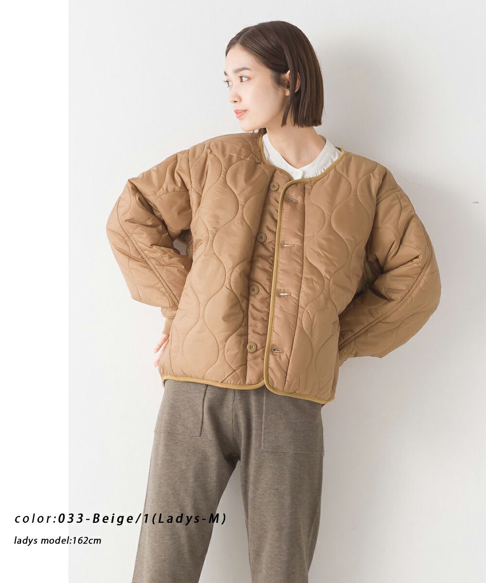 日本 OMNES - 輕量斜衣襬衍縫短版保暖外套-杏