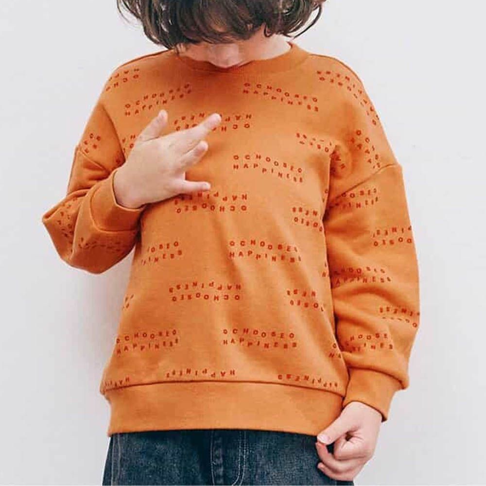 100%棉 繽紛感印花縮口長袖上衣-英文-橘